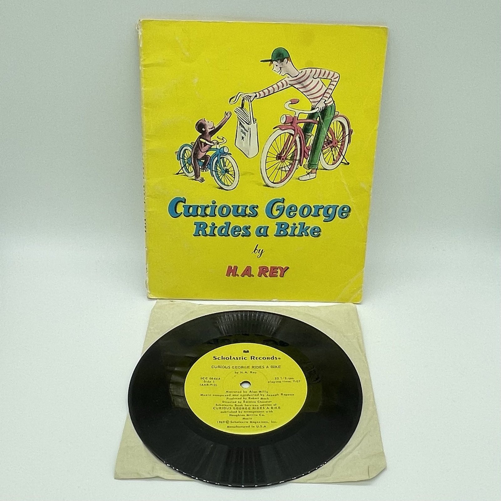 Curious George Rides a Bike book and record